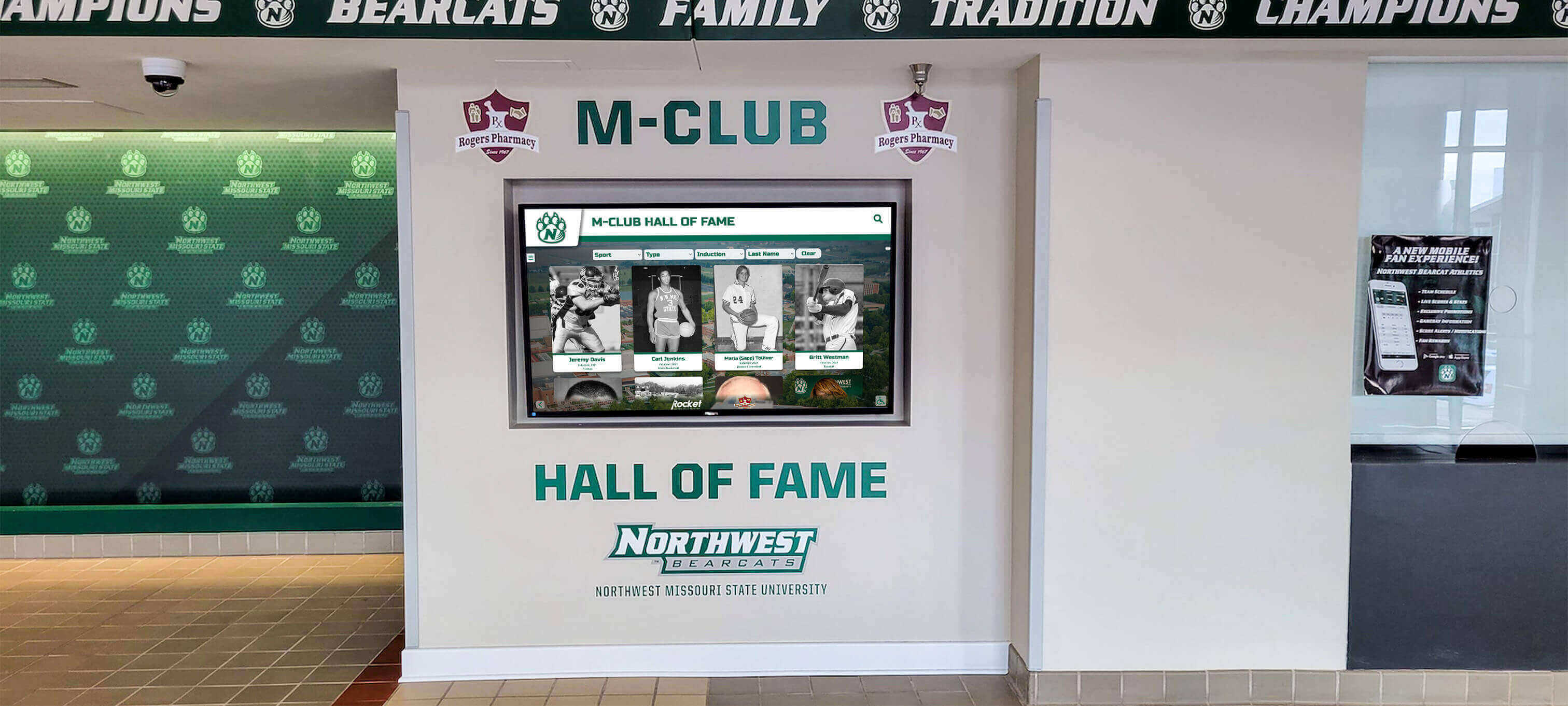 Northwest Missouri State M-Club Hall of Fame featuring a cloud-managed digital display system Northwest Missouri State Bearcats M-Club Hall of Fame digital display in the athletic facility