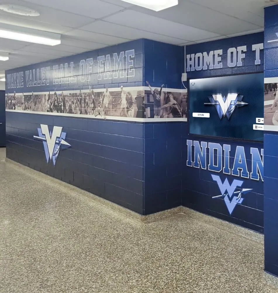 Wayne Valley Hall of Fame athletic hallway with Indians logo